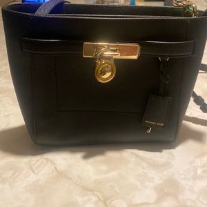 Michael Kors black crossbody purse.
